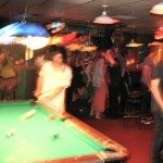 Trung Ngo, of TV Girl, shooting pool before their set